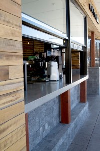 The architects at this cafe love the look of concrete making Mitchell's work a prominent part of the overall design.