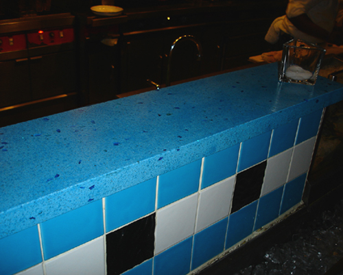 Aqua blue oyster bar with blue glass
