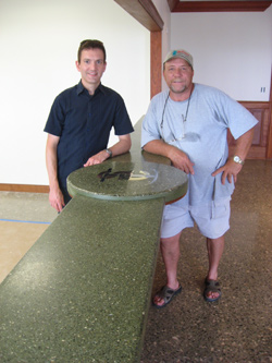 Jeff Girard and Terry Wilson with long green concrete countertop in Grand Cayman