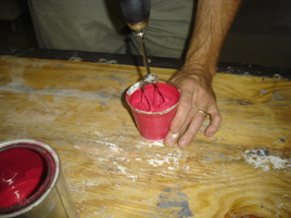 mixing tiny batch of red concrete