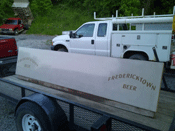 concrete countertop with logo embedded being transported on truck