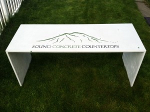 white concrete furniture bench or desk with Sound Concrete Countertop logo