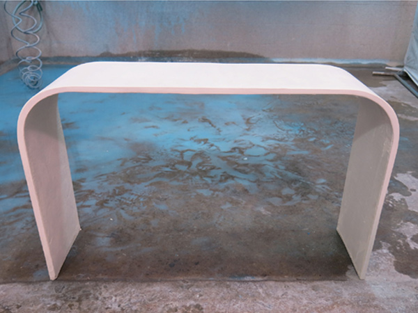 curved white concrete furniture bench made from GFRC