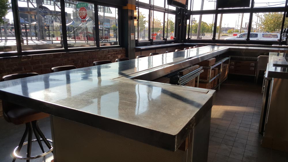 polished concrete bartop in restaurant