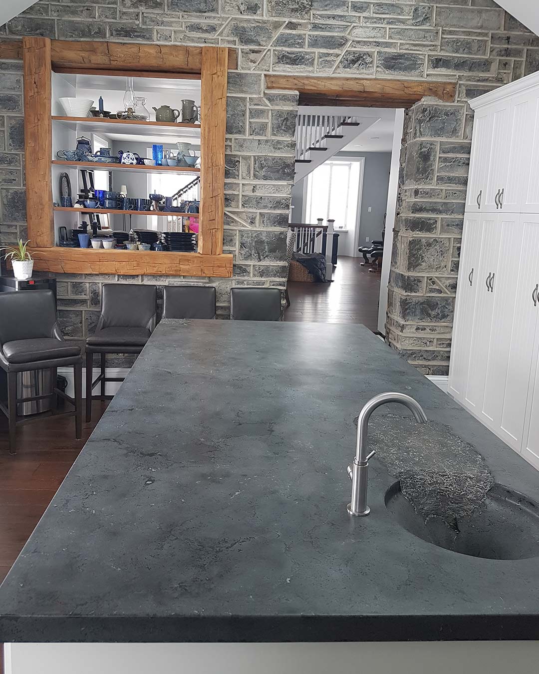 concrete countertop kitchen island with custom bar sink